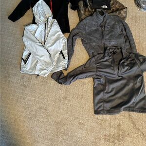 The North Face jackets, gloves, windbreakers, and undergarments.